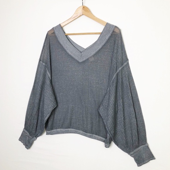 Free people with a free, gray, sheer oversized top - Picture 3 of 12